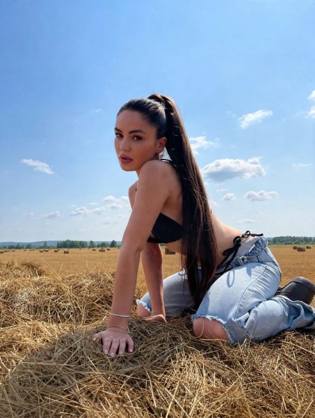 Woman hayfield direct gaze