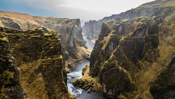 Cliff-aerial-mountains-5k-bd-5120x2880